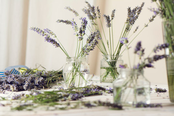 Small bouquet of fresh lavender in jars with water