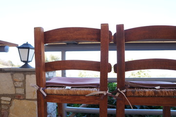 Two stool chairs on a village tavern