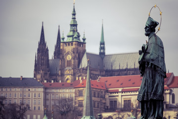 Naklejka premium sculpture on Karlov Bridge in Prague, the Czech Republic