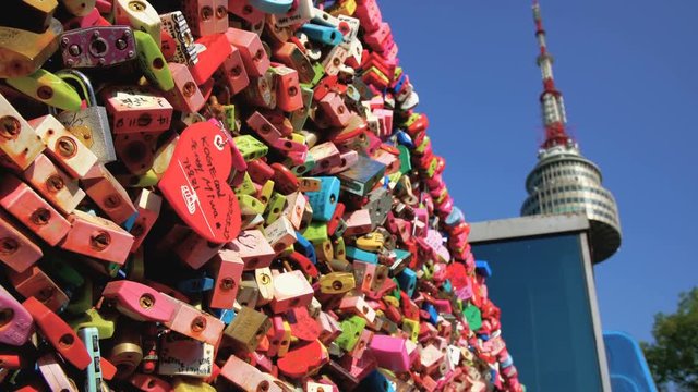 Plenty of Locked master key on the fence of Namsan Tower in Seoul, South Korea. People believe that the locked key will keep their forever love. 