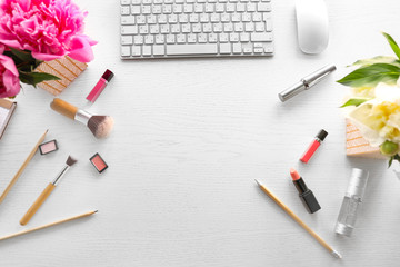 Beautiful peony flowers as floral decor on wooden table