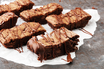 homemade chocolate brownies on grey background