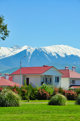 Fototapeta na wymiar house on a background of mountains in the Adler district of Sochi