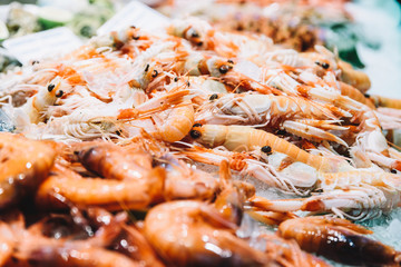 Fresh Shrimps Seafood On Ice In Fish Market