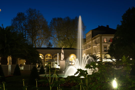 Bad Kissingen spa park with fountain at night
