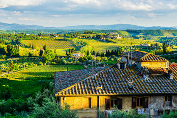 Sunset and houses in Tuscany