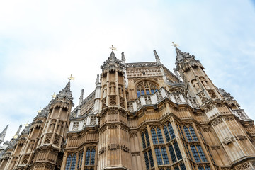 Fototapeta na wymiar View from below of Palace of Westminster, seat of the Parliament of the UK