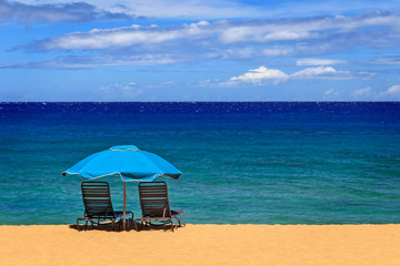 Two Chairs And An Umbrella