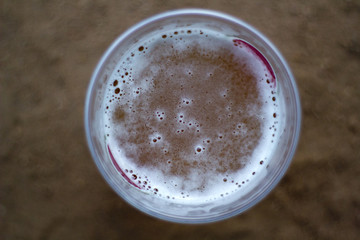 Glass of beer from above view