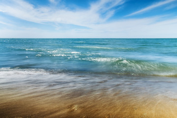 Fototapeta na wymiar Beach and Small Waves
