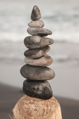 Pebbles in balance on the beach of El Tunco, El Salvador