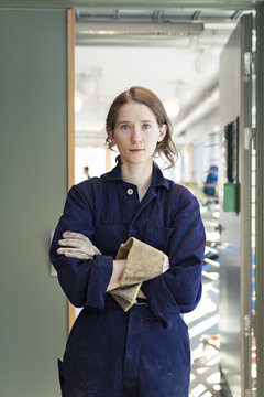 Portrait of young woman in workshop