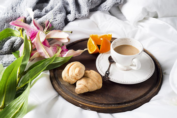 Pink lilies and coffee cup
