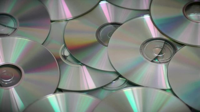 Compact Optical cd or Dvds Disks Rotating Slowly