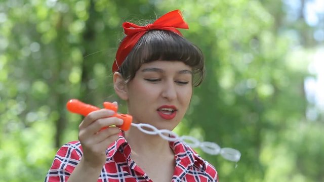 Beautiful lady in the style of pinap with soap bubbles