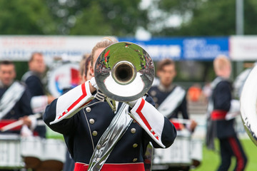 Brass band playing live music during performance