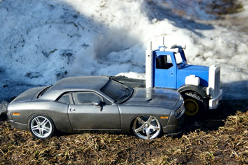 Obraz na płótnie Canvas Toy cars in winter