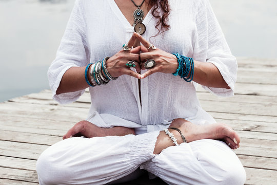 woman hand in yoga symbolic gesture mudra