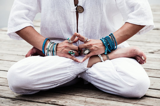 woman hand in yoga symbolic gesture mudra