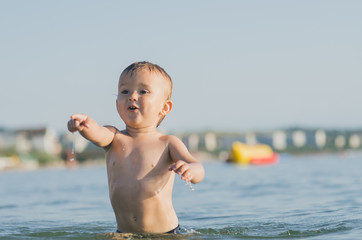 Little boy swimming in sea