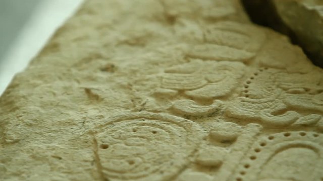 The ancient Mayan stone. Pan shot of the details of the ancient Mayan calendar