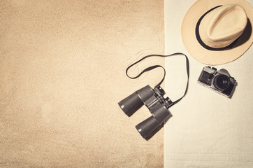 Top view photograph of sandy beach. Frame composition. Vintage effect background with copy space. Frame for advertising or concepts