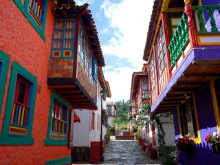 Fototapeten A pretty street in Pueblito Boyacense, every street represents a different village in the Colombian department of Boyaca © James