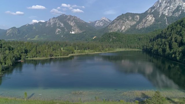 Aerial footage of a beautiful lake in the Bavarian alps in Germany. This is in 4k quality.