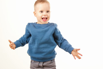 Happy boy laughing showing white teeth, a child expressing emotions,