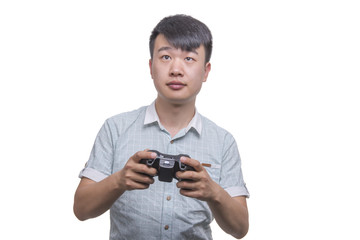 Attractive Young Man With Video Game Control Pad. Shot in studio over white.