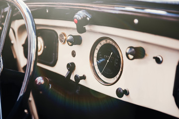 Interior view of classic vintage car. Instagram toning. Beautiful retro car poster, postcard.