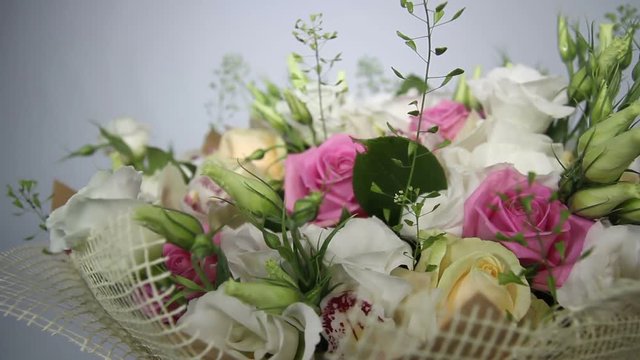 Pink roses and eustoma bouquet. right to left motion