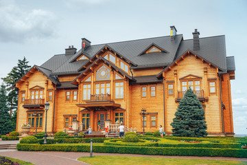 MEZHYHIRYA, UKRAINE - JUNE 22, 2017: Elegant wooden cottage honka in Mezhyhirya
