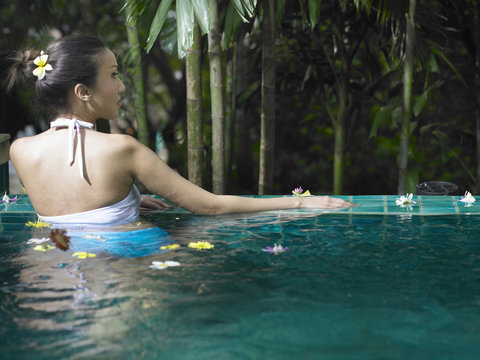 Woman by the poolside