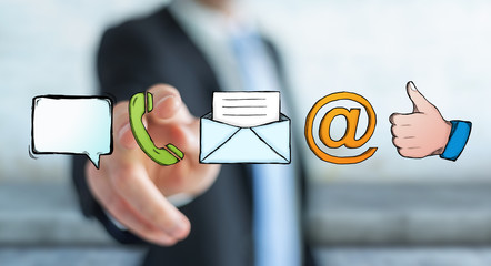 Businessman touching manuscript contact icon with his finger