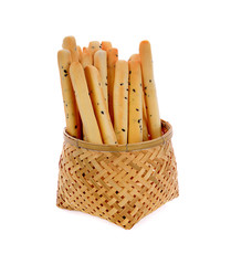 Black sesame biscuits in Bamboo basket isolated on white background