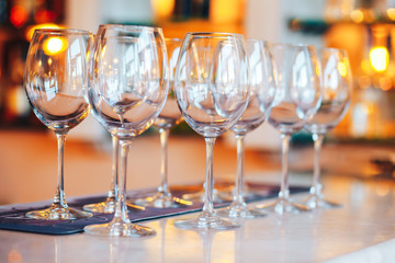 Close up empty glasses in restaurant natural light