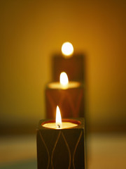 A row tea light in holders