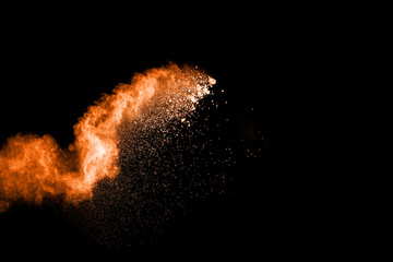 abstract multicolored powder splatted on black background,Freeze motion of color powder exploding