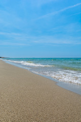 Strand mit sand un wasser vom Meer