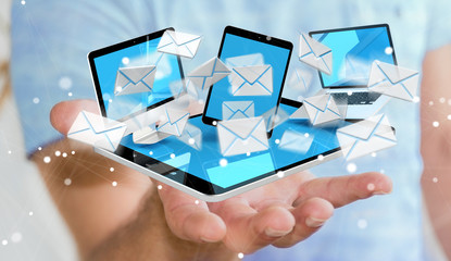 Businessman receiving e-mails on his digital devices 3D rendering