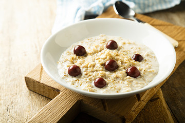 Porridge with brown sugar an cherries