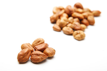 Hazelnuts isolated on white background