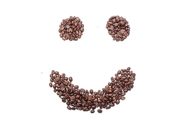 Cheerful smiley from coffee beans, isolated on white background
