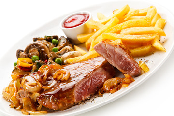 Grilled beef steak with french fries on white background 