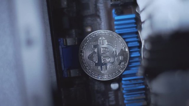 Symbol of mining bitcoin, close-up