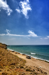 Camping on the beach with a caravan, freedom concept
