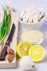 Fresh ingredients for avgolemono - traditional soup with lemon, chicken, orzo, rice or couscous.