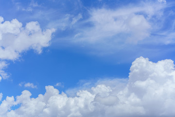 Naklejka na ściany i meble Beautiful white clouds and blue sky background