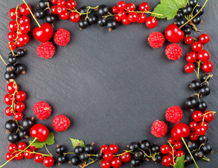 Fresh berries of cherry, raspberries, red currant and black currant